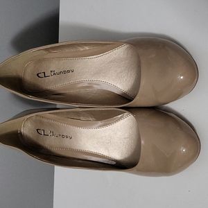 Nude patent wedge heels